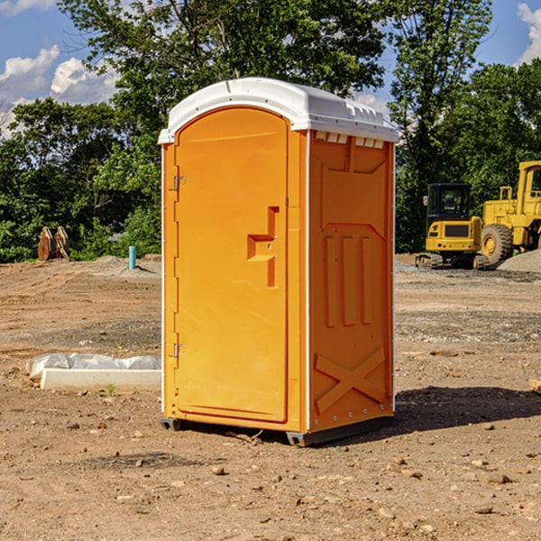 how often are the portable restrooms cleaned and serviced during a rental period in Midland Washington